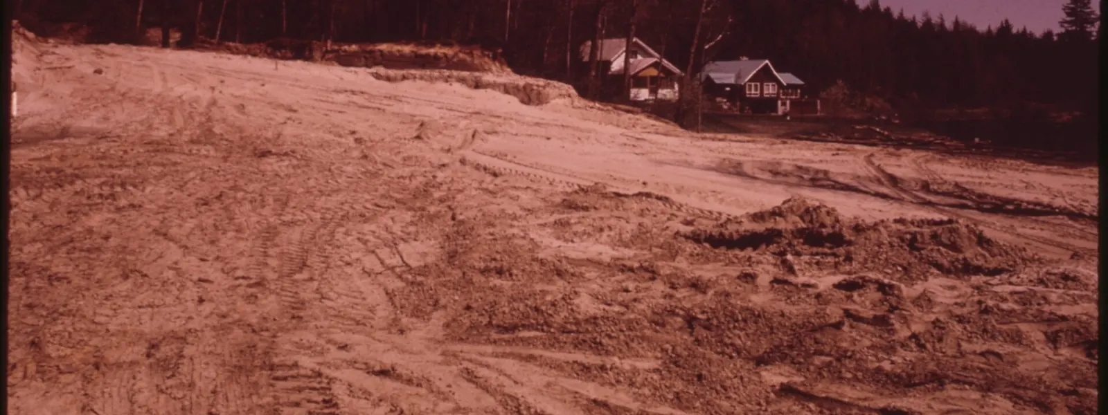 A wide view of a cleared and graded building site
